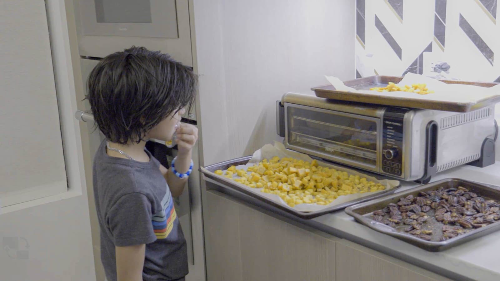 A young Sous customer trying food at home